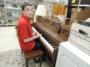 The Lifesavers Foundation Upscale Resale piano boy c