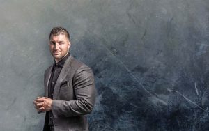 background with Tim Tebow