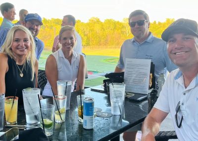 TopGolf friends at table
